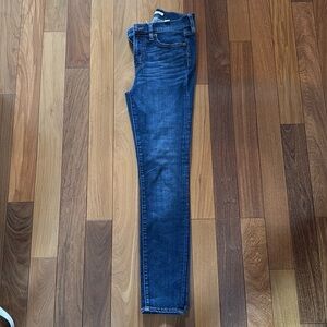 Medium/dark wash skinny jeans, J Crew brand, unsure of exact size (about a 4/6)